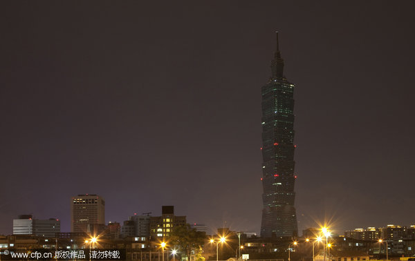 A general view of the Taipei 101 tower as the lights are switched off for Earth Hour on March 27, 2010 in Taipei, Taiwan. The global switch off aims to encourage the reduction of pollution and raise awareness of climate change.