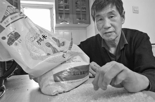 Mei Duanshi, a 61-year-old retired farmer from Heijongjiang province, spent more than three decades growing rice. He is wary about the safety of genetically modifi ed rice. [PENG YINING / CHINA DAILY