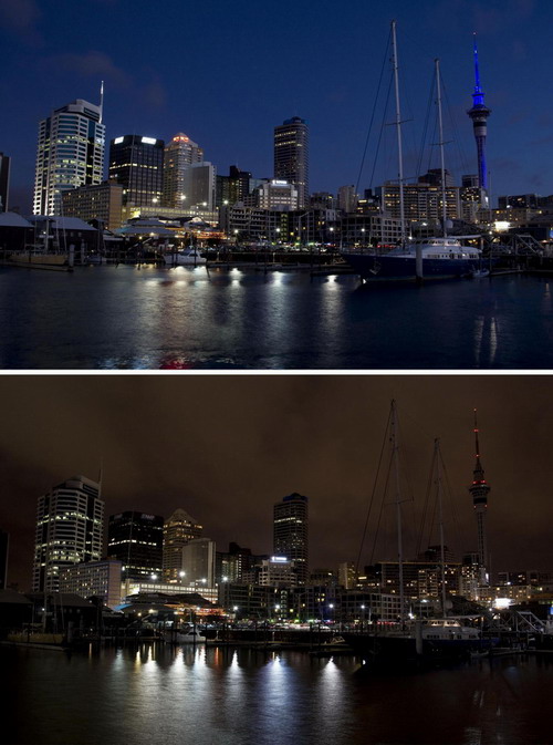 Twilight sets on Auckland as it approaches Earth Hour (top) and the lights go off on Auckland as it enters Earth Hour (bottom) March 27, 2010 in this combination picture. Earth Hour, when everyone is asked to turn off lights for an hour from 8.30 p.m. local time, is a show of support for tougher action to confront climate change. Viaduct Harbour is seen in the foreground, the Sky Tower at right. [China Daily via Agencies]