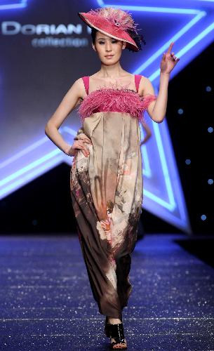 A model presents a creation designed by Dorian Ho in Beijing, China, March 28, 2010.