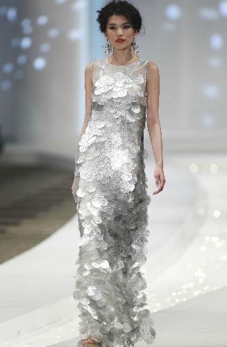 A model presents a design of MARISFROLG in Beijing, China, March 28, 2010.