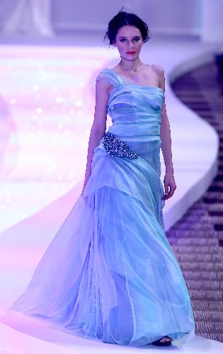 A model presents a design of MARISFROLG in Beijing, China, March 28, 2010.