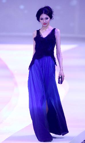 A model presents a design of MARISFROLG in Beijing, China, March 28, 2010.