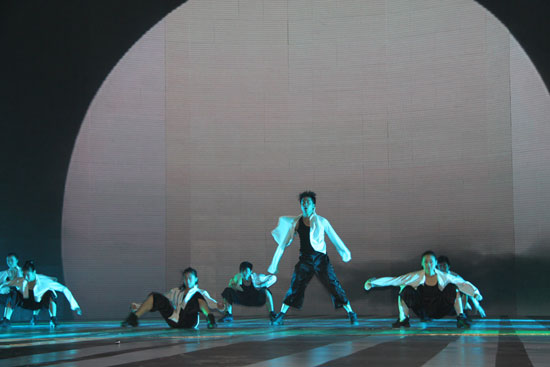 Dancers perform at the 6th China National Garment Association Awards at the Century Theater in Beijing on March 28, 2010. 