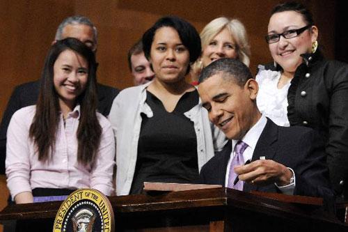 U.S. President Barack Obama on Tuesday signs into law the &apos;fixes&apos; bill of health care reform passed last week in the Congress at a community college in Alexandria, Virginia, a Washington suburb.