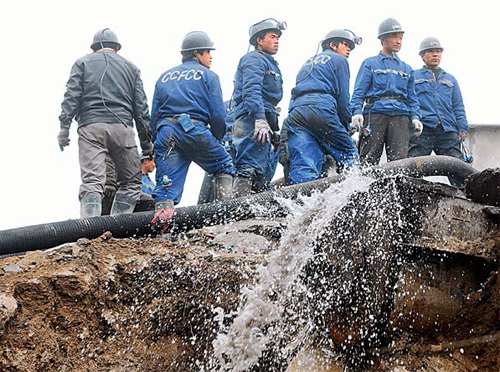 Water is pumped out of the Wangjialing Coal Mine in Shanxi province on Wednesday. [Xinhua]