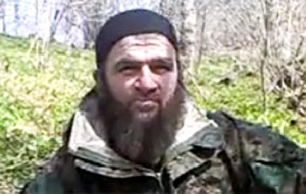 Chechen rebel leader Doku Umarov is seen in this screenshot taken March 31, 2010. Umarov claimed responsibility for suicide bombings in the Moscow metro that killed at least 39 people, according to a video posted on an unofficial Islamist rebel website on Wednesday. [Xinhua]