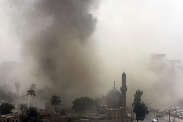 Smoke arises on the spot where explosions took place in Bagdad, capital of Iraq. [Xinhua]