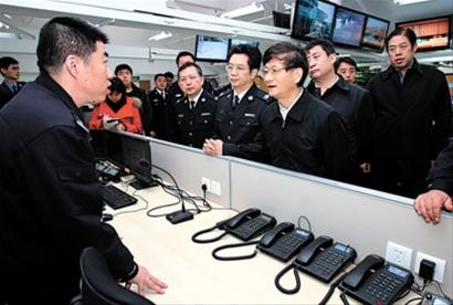 China’s State Councilor and Minister of Public Security Meng Jianzhu inspects security preparations within the Expo site. 
