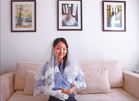 Japanese Miyoshi Nakahara plans for high-end weddings.[ Zou Hong / China Daily]