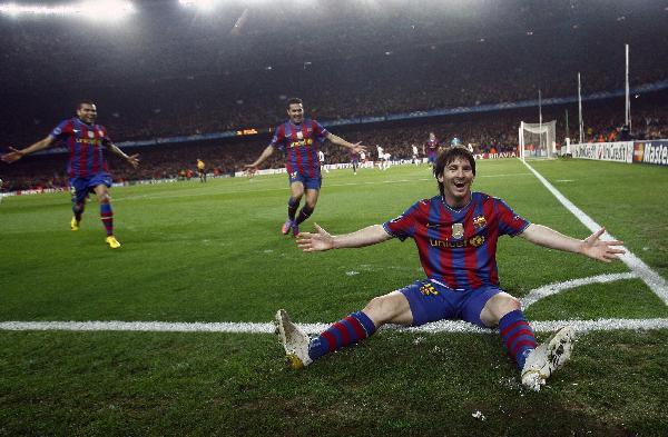 Barcelona's Lionel Messi celebrates after scoring against Arsenal during their Champions League quarter-final, second leg soccer match at Nou Camp stadium in Barcelona April 6, 2010. (Xinhua/Reuters Photo) 