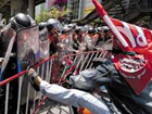 Thai red-shirt protesters storm parliament grounds