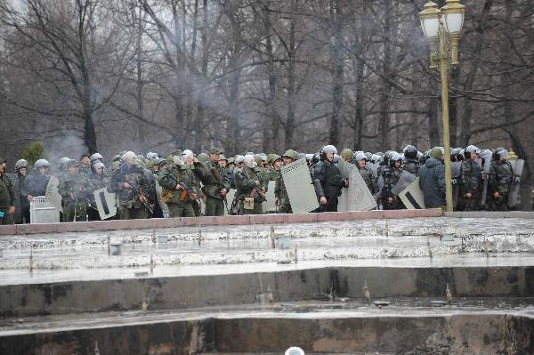 Policemen disperse protestors in Bishkek, capital of Kyrgyzstan, April 7, 2010. (Xinhua/Sadat)