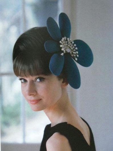 A rarely-seen photo of Audrey Hepburn wearing a hat. 