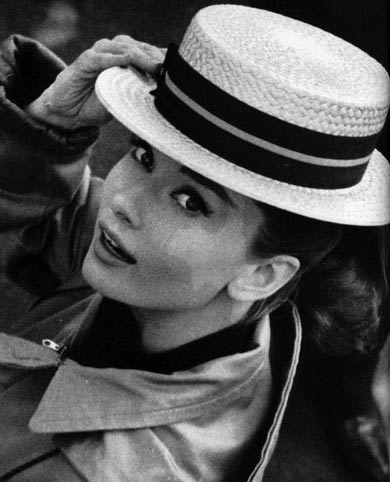 A rarely-seen photo of Audrey Hepburn wearing a hat. 