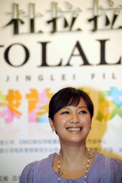 Director and actress Xu Jinglei attends the premiere press conference for the movie 'Go Lala Go' in Beijing, capital of China, April 7, 2010. The movie adapted from the best-selling novel 'Du Lala's Promotion' will release on April 15, 2010.[