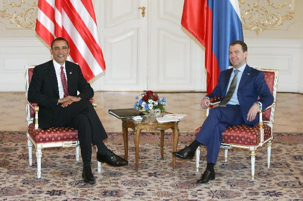 U.S. President Barack Obama (L) meets with Russian President Dmitry Medvedev before they sign the landmark treaty to make new reductions in their nuclear arsenals in Prague, capital of Czech Republic, on April 8, 2010. [Xinhua]