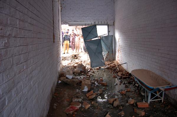 Photo taken on April 8, 2010 shows the school damaged by blasts in Peshawar, northwest Pakistan. Unidentified militants late night between Wednesday and Thursday attacked at least three schools located in separate parts of northwest Pakistan&apos;s Peshawar, police sources said. [Saeed Ahmad/Xinhua]