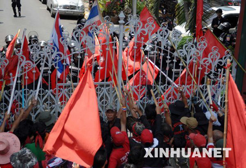Police and anti-government protesters known as 'red-shirts' clash in Thailand‎ on April 7, 2010. Thailand's criminal court on Friday approved to issue arrest warrants against three core leaders of anti-government protesters known as 'red-shirts' who caused the shutdown of the Rathchaprasong Intersection, a major commercial area in the capital Bangkok.