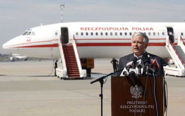 Polish President Lech Kaczynski speaks in front of a Polish government Tupolev Tu-154 aircraft at Krakow airport in this August 8, 2008 file photo. Kaczynski was feared dead after his plane crashed on approach to a Russian airport on Saturday. [Xinhua]