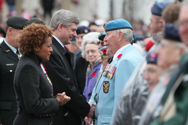 Canadian Prime Minister Stephen Harper (L2) and Governor General Michalle Jean (L1) salute to veterans at the Vimy Ridge Day commemoration at Ottawa, capital of Canada, April 9, 2010. Canada held a grand ceremony at the National War Memorial in Ottawa on Friday, officially marked the end of an era as the country's last known World War I veteran John Babcock was gone earlier.