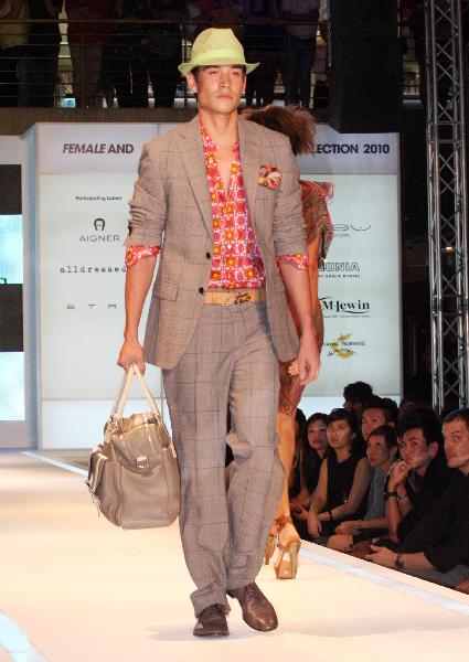 A model presents a design during a fashion show at Paragon shopping mall in Singapore, April 10, 2010. The event showcased 10 international brands with 125 models presenting creations. It is also a part of this year's six-week Fashion Season at Orchard campaign in Singapore.