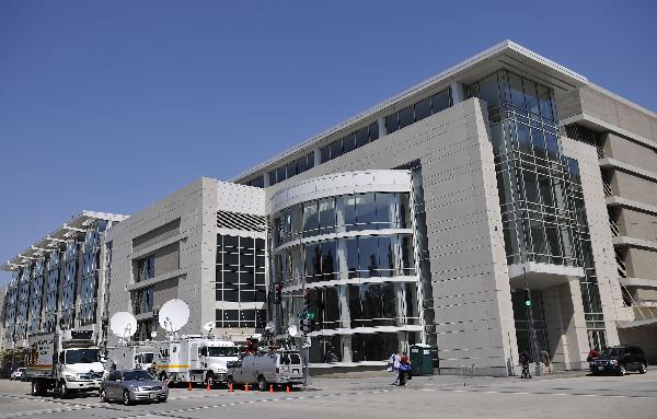TV broadcast vehicles park outside the Washington Convention Center in Washington D.C., capital of the United States, April 11, 2010. Washington beefed up its security for the upcoming Nuclear Security Summit due on April 12 and 13. [Zhang Jun/Xinhua]
