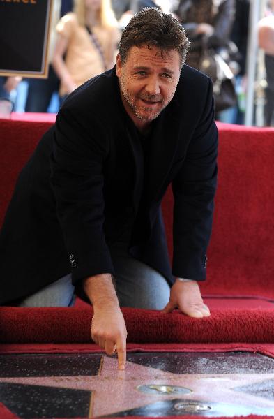 Academy Award actor Russell Crowe is honored with a star on the Hollywood Walk of Fame on Monday, Apr. 12, 2010, in Los Angeles.