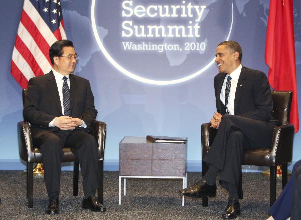 Chinese President Hu Jintao (L) meets with U.S. President Barack Obama in Washington April 12, 2010. President Hu Jintao arrived in Washington on Monday to attend the Nuclear Security Summit slated for April 12-13. [Li Xueren/Xinhua]