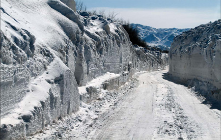 The roads to Wuxuete in the Xinjiang Uygur autonomous region are lined with 3-m-high walls of snow, while large parts of the village have also been buried after a series of heavy snowstorms.[China Daily] 