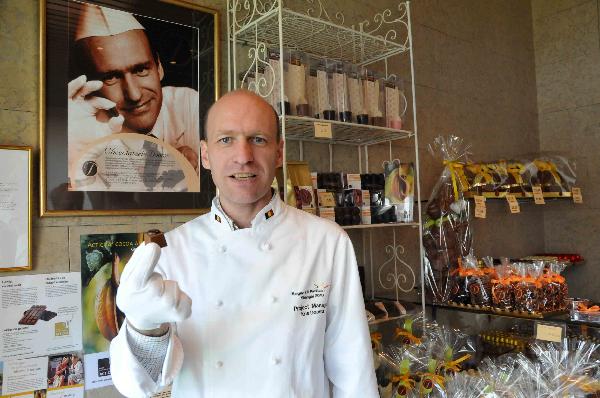 Belgian chocolate maker Kris Dooms introduces chocolate in Belgium on March 18, 2010. Belgium will set up a 'chocolate corner' at Belgian pavilion to showcase the worldwide famous Belgian chocolate and its production process during the Shanghai World Expo in China. (Xinhua/Wang Xiaojun)