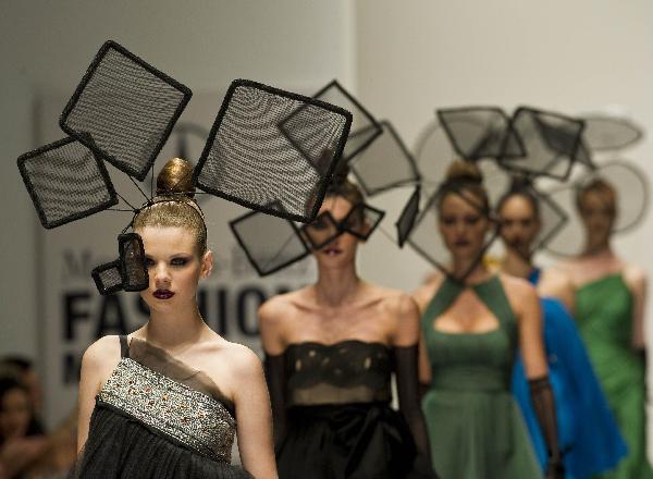 Models display creations during the Mercedes Benz Fashion Week in Mexico City, April 13, 2010.