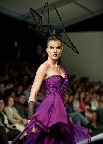 Models display creations during the Mercedes Benz Fashion Week in Mexico City, April 13, 2010.