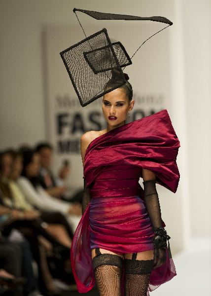 Models display creations during the Mercedes Benz Fashion Week in Mexico City, April 13, 2010. 