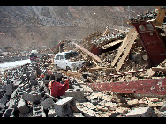 Debris are seen following a 7.1 magnitude earthquake which struck China's Qinghai province just before 8am local time on April 14, 2010 in Yushu county, Qinghai province of China. [Xinhua]
