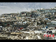Debris are seen following a 7.1 magnitude earthquake which struck China's Qinghai province just before 8am local time on April 14, 2010 in Yushu county, Qinghai province of China. [Chinanews.com]