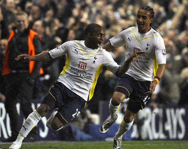 Tottenham Hotspur's Danny Rose (L) celebrates after scoring a goal against Arsenal during their English Premier League soccer match at White Hart Lane in London April 14, 2010. (Xinhua/Reuters Photo)