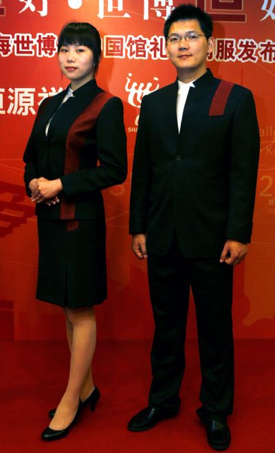  Models present the uniforms for the Chinese pavilion at the 2010 Shanghai World Expo in Shanghai, east China, April 15, 2010. The uniforms for the receptionists and staff members of the Chinese pavilion were unveiled on Thursday. The uniforms, which are environmentally friendly and high-tech, are designed under the theme of 'Better Cities, Better Life'. (Xinhua/Chen Fei)