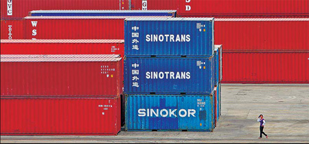 A container port in Nanjing. Exports are yet to see a strong growth due to the fragile global recovery. [China Daily]