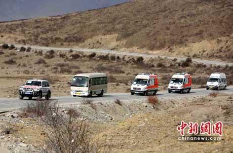 Medical teams from the General Logistics Department of the People's Liberation Army are working around the clock in Yushu. They have treated over one thousand injured people so far.
