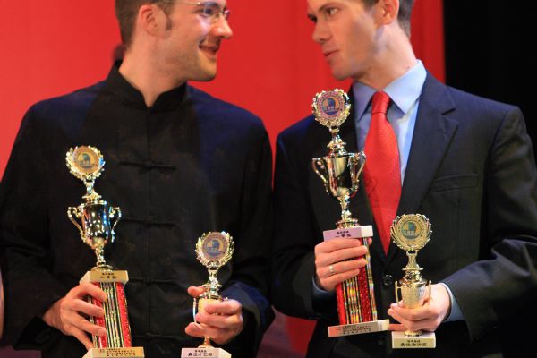 Two prize winners hold their trophies during the 'Chinese Bridge' Greater New York Chinese Proficiency Competition for Foreign College Students held at Pace University in New York, the United States, April 17, 2010. 