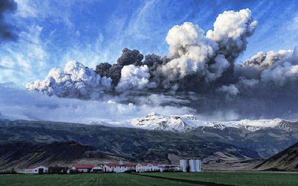 Smoke and steam hangs over the volcano under the Eyjafjallajokull glacier in Iceland, Wednesday April 14, 2010. [Xinhua] 