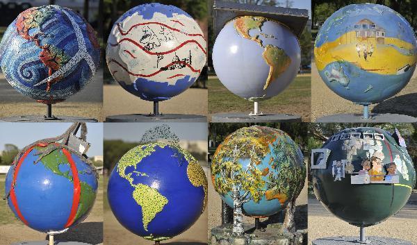 A combined photo taken on April 19, 2010 shows earth models that will be displayed on Earth Day in Washington D.C., the United States. A massive Climate Rally will be held in the US capital on Sunday to commemorate the 40th anniversary of Earth Day. [Xinhua]