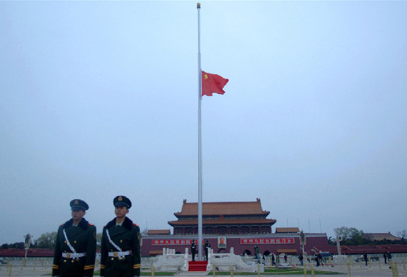 Chinese national flag flies at half-mast to mourn the victims of Yushu earthquake, in the Tian'anmen Square in Beijing, China, April 21, 2010. The State Council, China's cabinet, announced a national day of mourning would be held on Wednesday for the quake victims. [Xinhua]