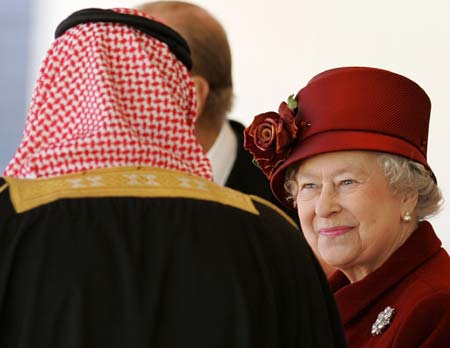 Britain&apos;s Queen Elizabeth smiles towards King Abdullah of Saudi Arabia at a ceremonial welcome in Horse Guards, London Oct. 30, 2007. King Abdullah met the Queen on Tuesday at the start of a two-day state visit that has attracted widespread criticism of the Saudi human rights record.