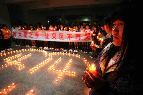 People across China light candles to mourn the Yushu earthquake dead and pray for the affected. 