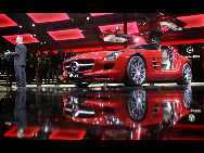 The new Mercedes-Benz SLS AMG is displayed at the 'Mercedes-Benz Car Luxury and Leadership Evening' ahead of the Beijing Auto Show, in Beijing April 22, 2010. Automakers from around the world are showing off their latest products and technology at the Beijing Auto Show, which opens this week. [China Daily via Agencies]
