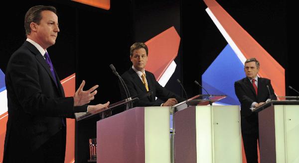 Britain's Prime Minister Gordon Brown (R), opposition Conservative Party leader David Cameron and Liberal Democrat leader Nick Clegg (L) take part in the second of Britain's leadership election debates, in Bristol, southwest England April 22, 2010. [Xinhua]