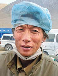 Pug Tashi, head of Baizha, who monitors relief supplies.