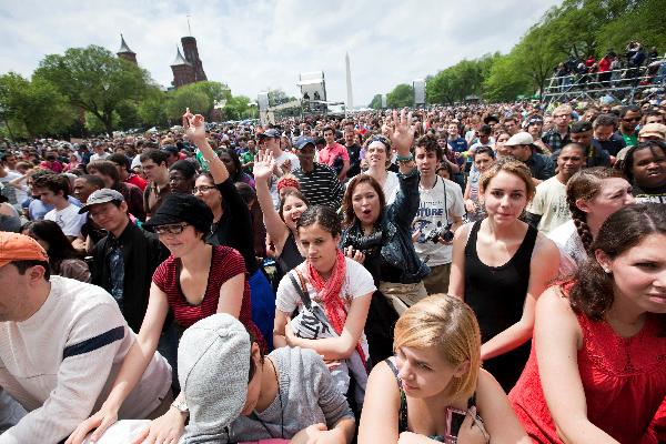 People join a mass Climate Rally at the National Mall in Washington D.C, capital of the United States, April 25, 2010. [Zhu Wei/Xinhua]